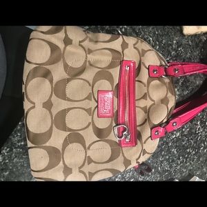 Pink and tan coach purse